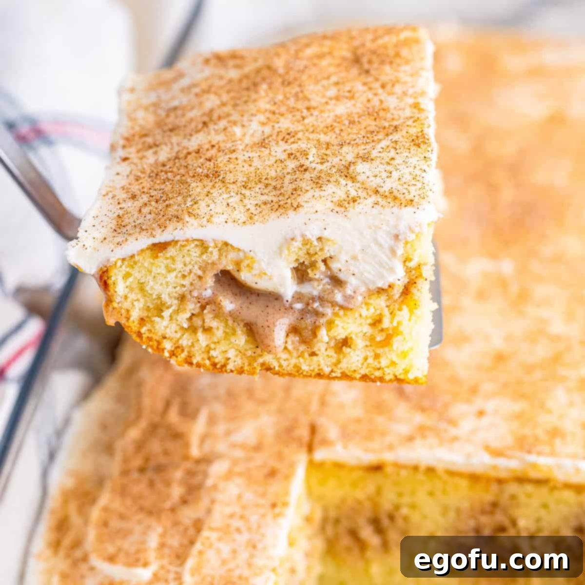 Cinnamon Swirl Poke Cake 1 featured 46272