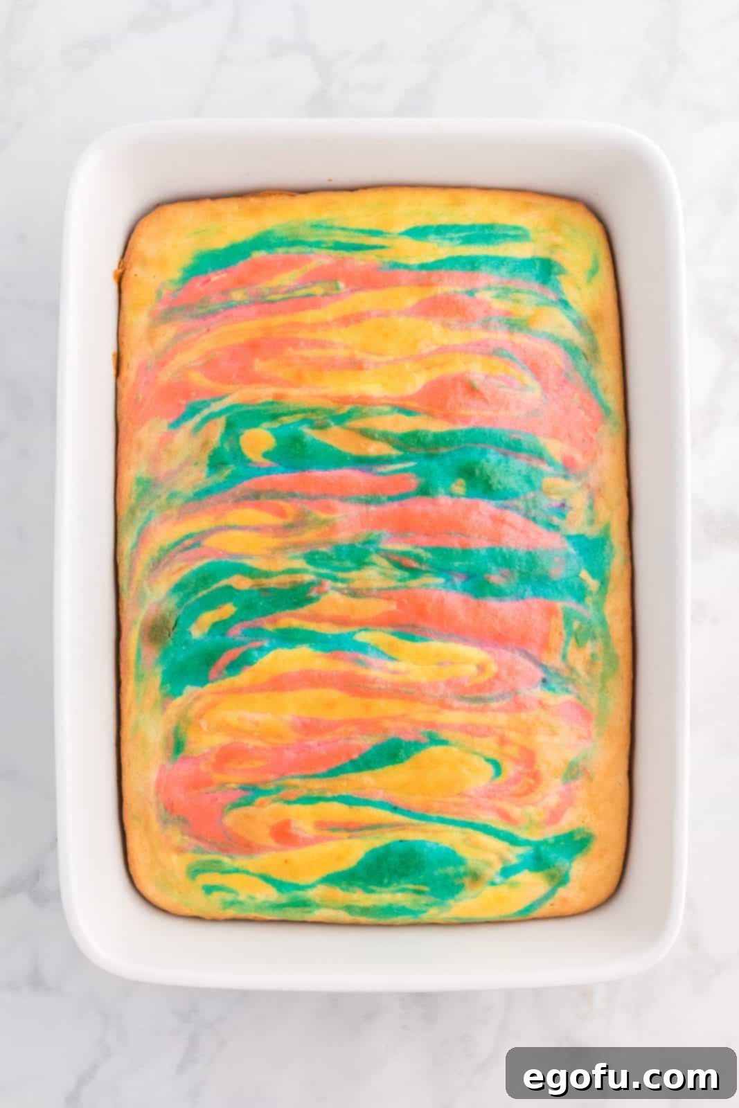 Finished Swirled Easter Cake, freshly baked out of the oven, cooling on a rack.