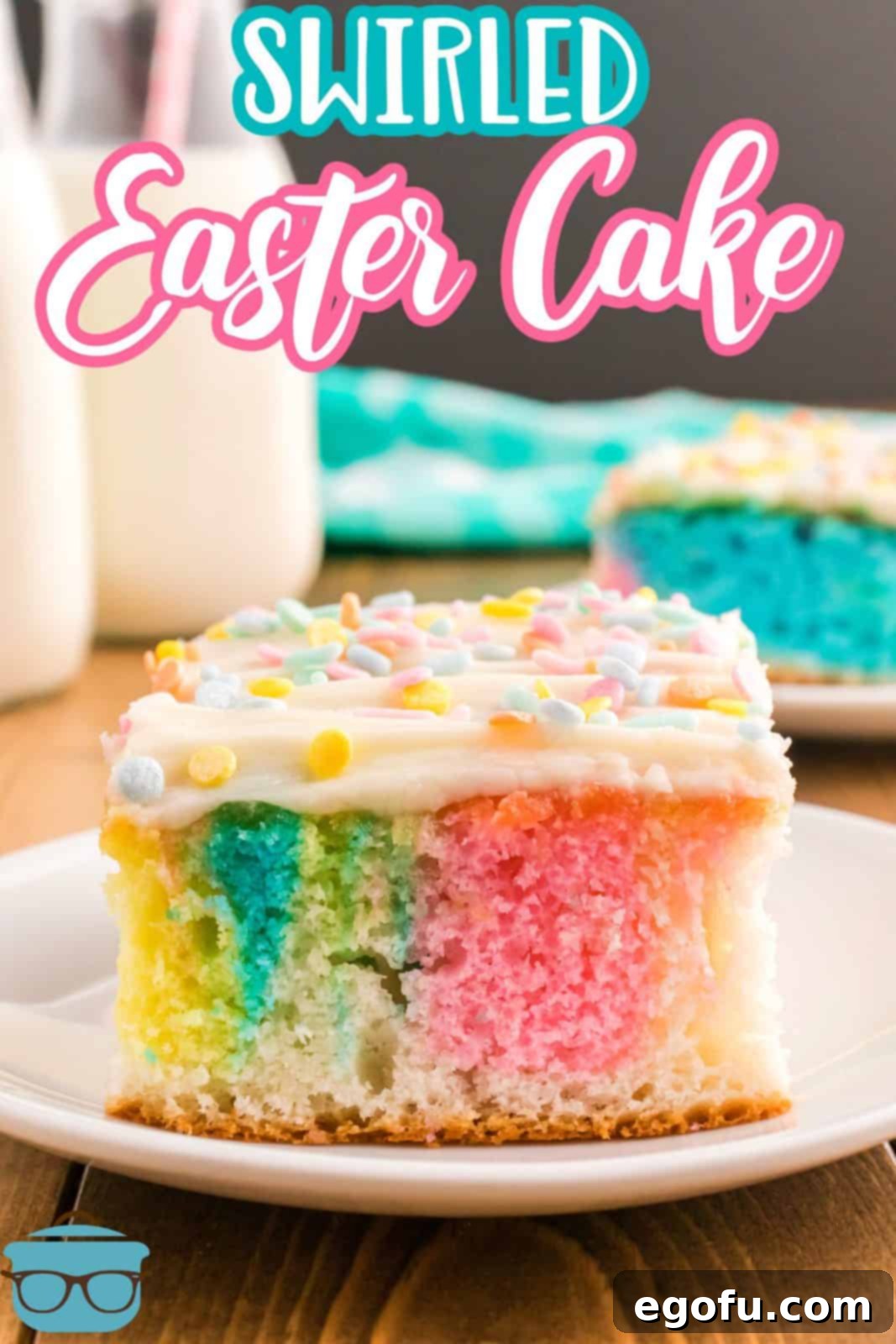 Close-up of a slice of Swirled Easter Cake on a white plate, showcasing the beautiful pastel color swirls.