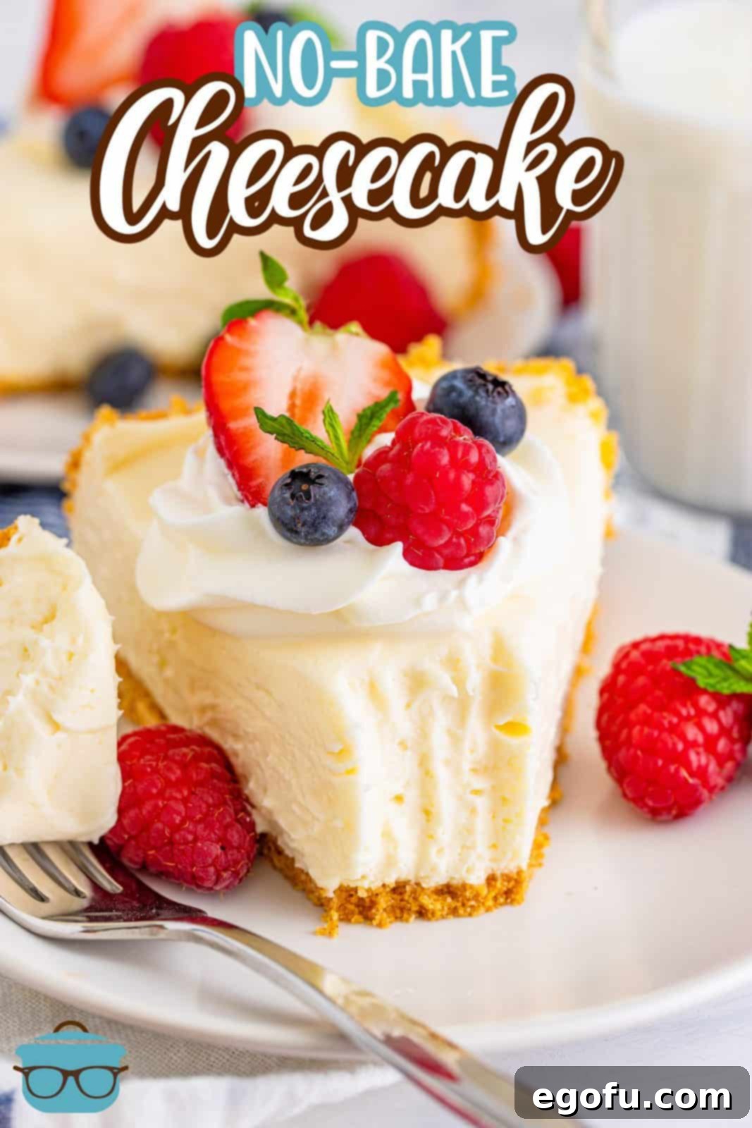 Pinterest image of slice of No-Bake Cheesecake with bite taken out and topped with fruit.