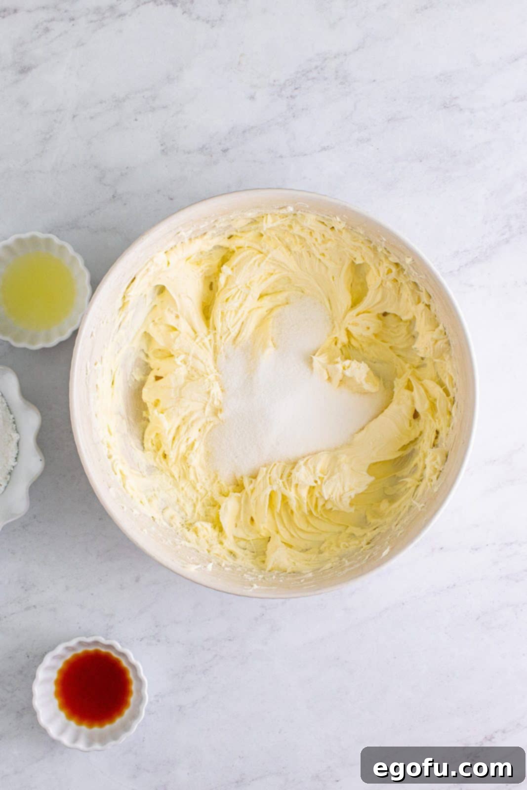 Sugar added to cream cheese mixture.