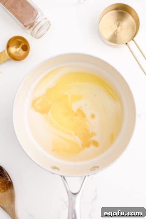 Water, granulated sugar, salt, and butter melted together in pan.