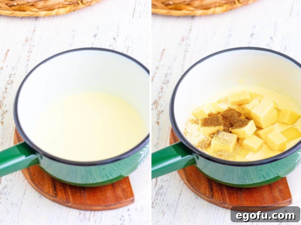 A saucepan on the stove, containing heavy cream gently bubbling, being whisked frequently.