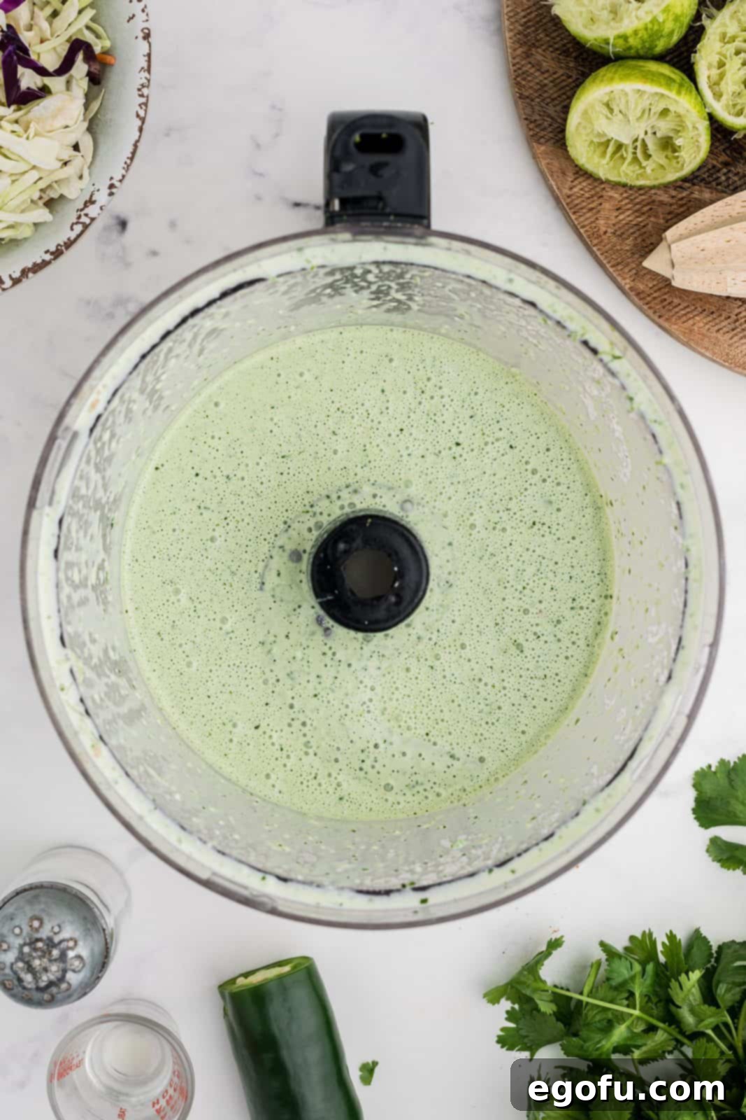 Blended up sauce ingredients in food processor.