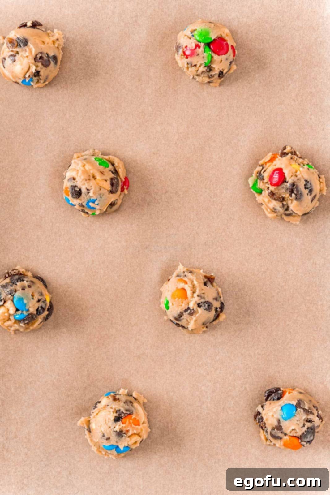 Cookies placed on parchment lined baking sheet.