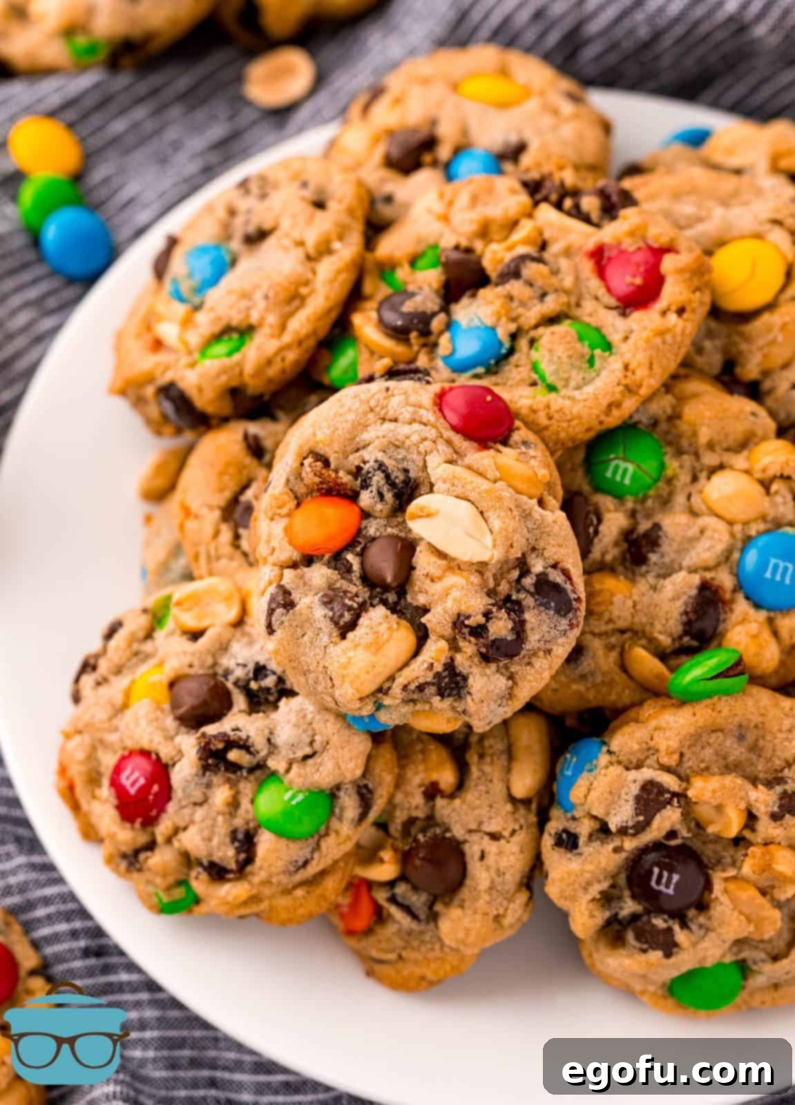Overhead photo of Trail Mix Cookies stacked on white plate.