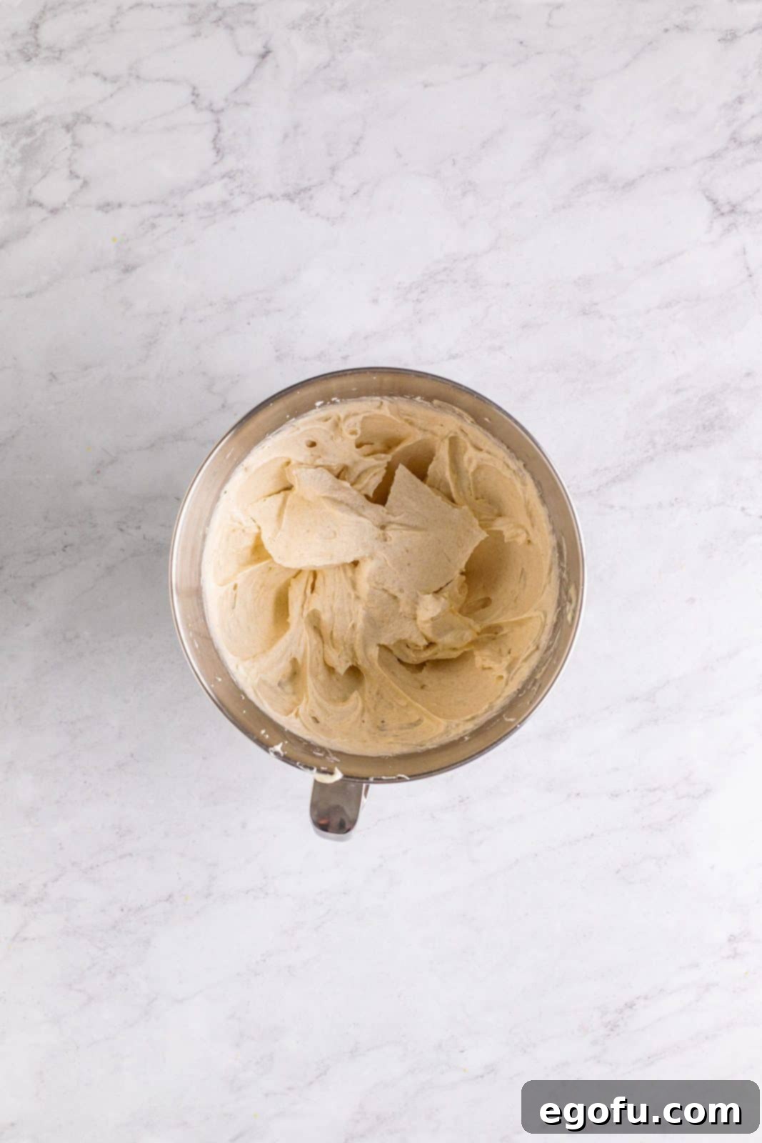 Southern Sunshine Cake 15 Finished frosting in bowl of stand mixer.