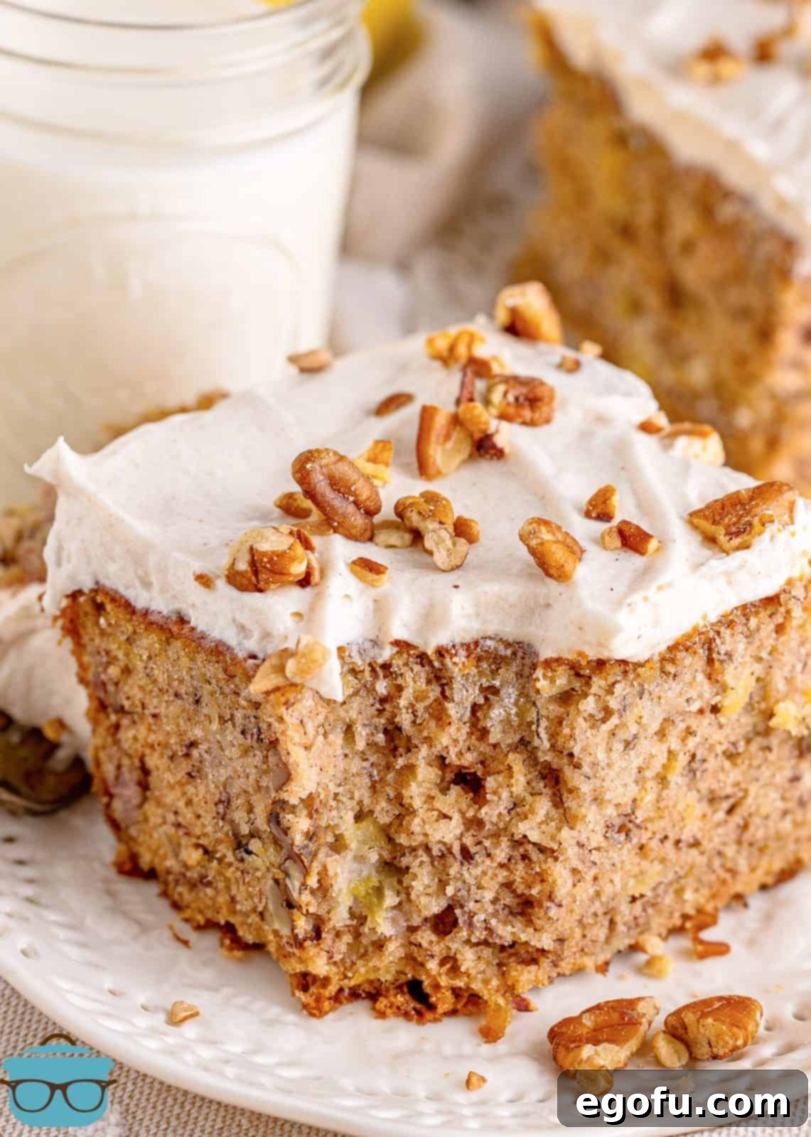 Southern Sunshine Cake 18 Bite taken out of one slice of Hummingbird Cake.