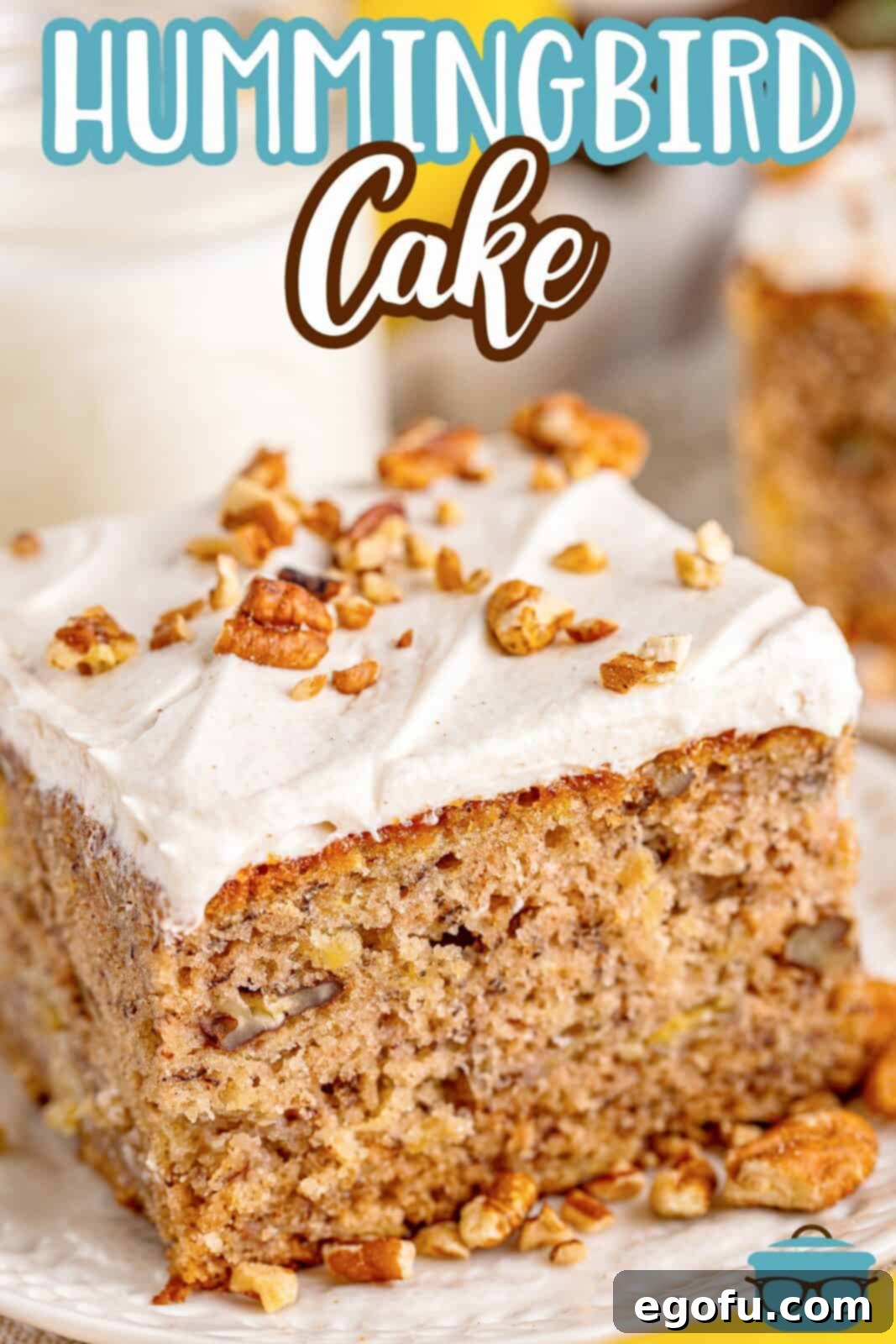Southern Sunshine Cake 3 Pinterest image close up of one slice of Hummingbird Cake on white plate with chopped nuts.