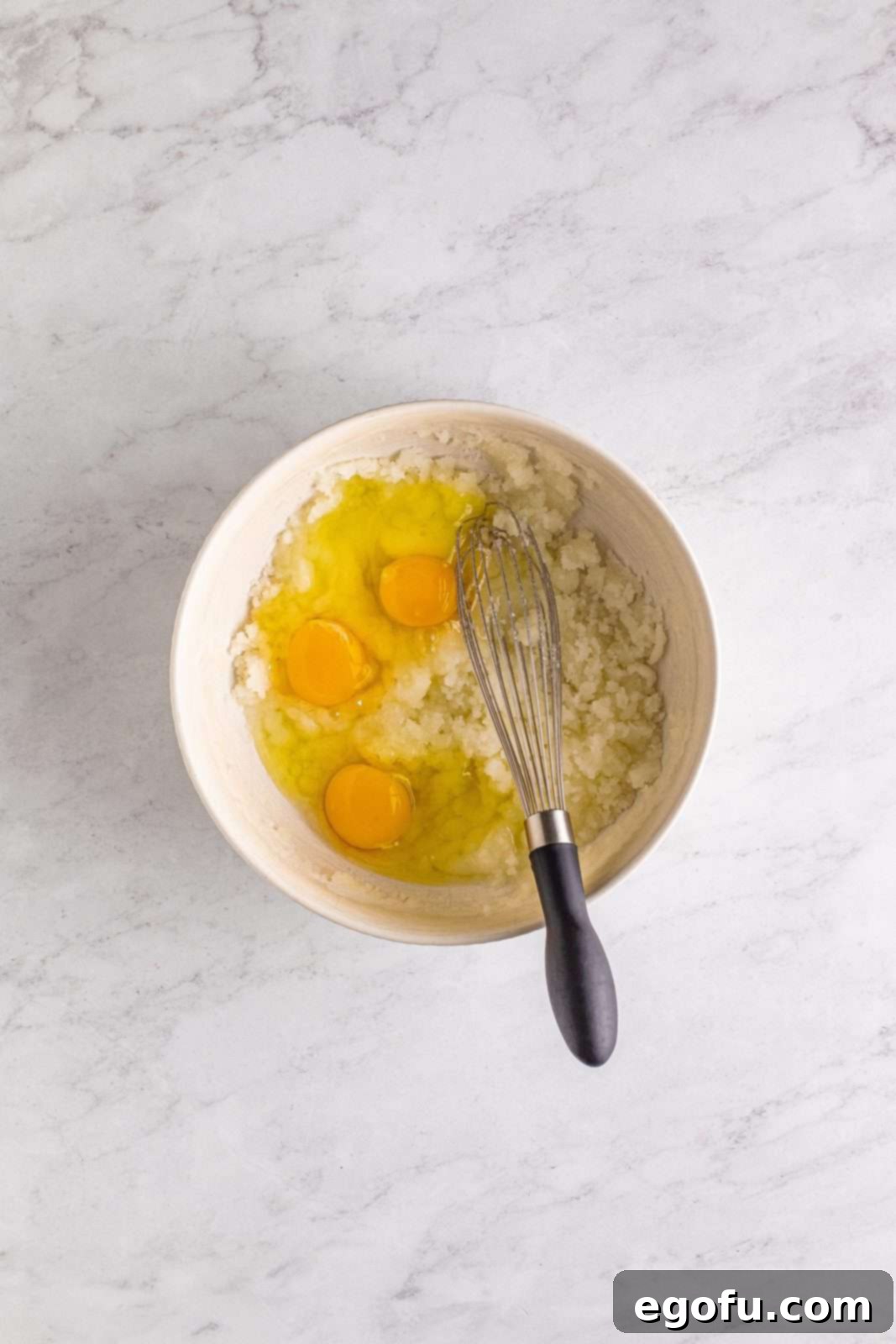 Southern Sunshine Cake 7 Eggs added to the sugar and butter mixture.