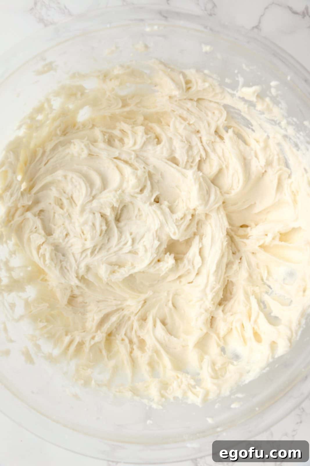 Finished frosting beaten in bowl.