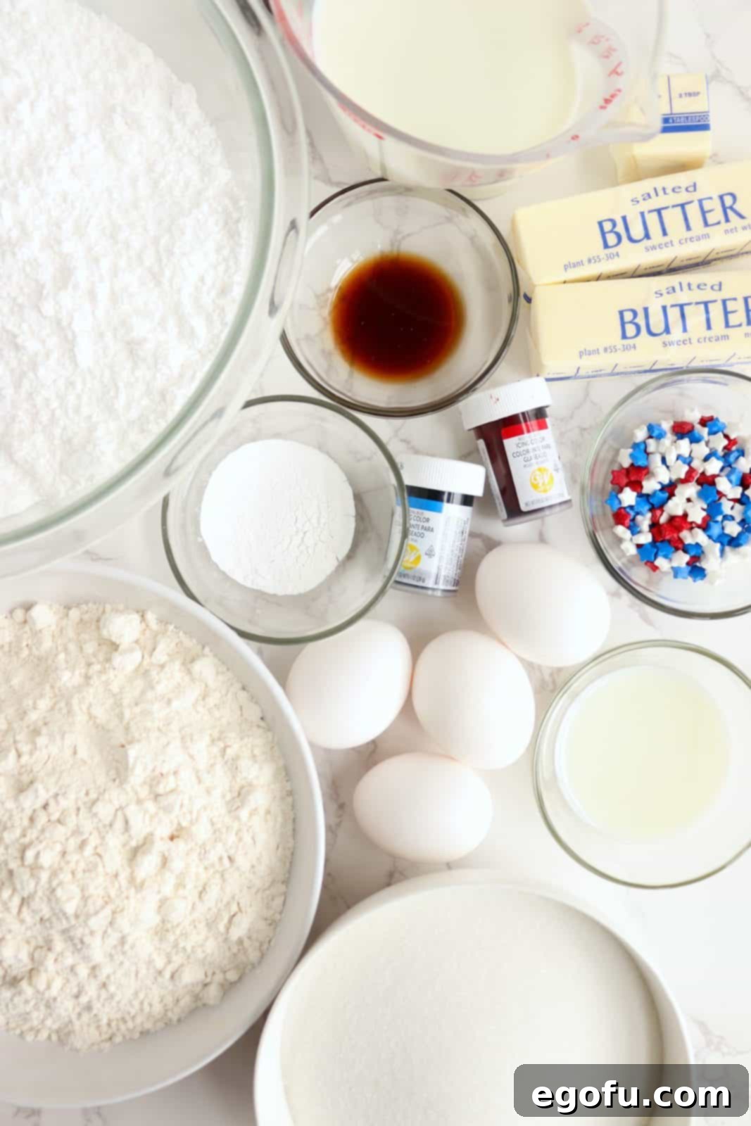 Ingredients needed: butter, granulated sugar, milk, all-purpose flour, baking powder, egg whites, blue and red food coloring, powdered sugar, vanilla and sprinkles of your choice.