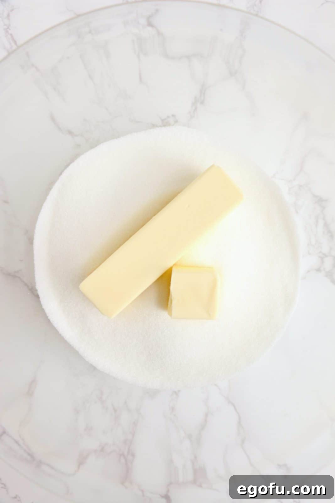 Butter and sugar in bowl.