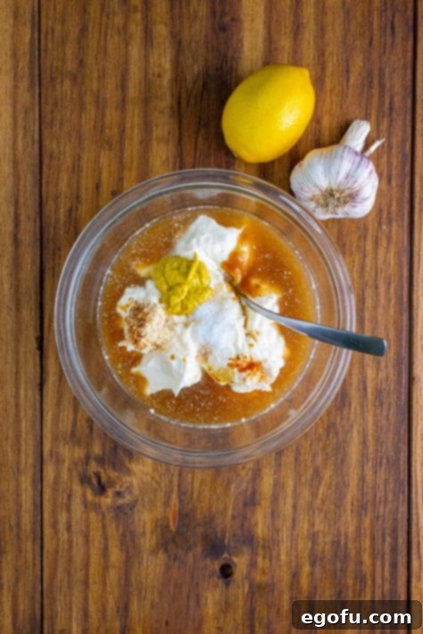 The South's Signature White BBQ 9 All ingredients in clear bowl ready to be mixed together.