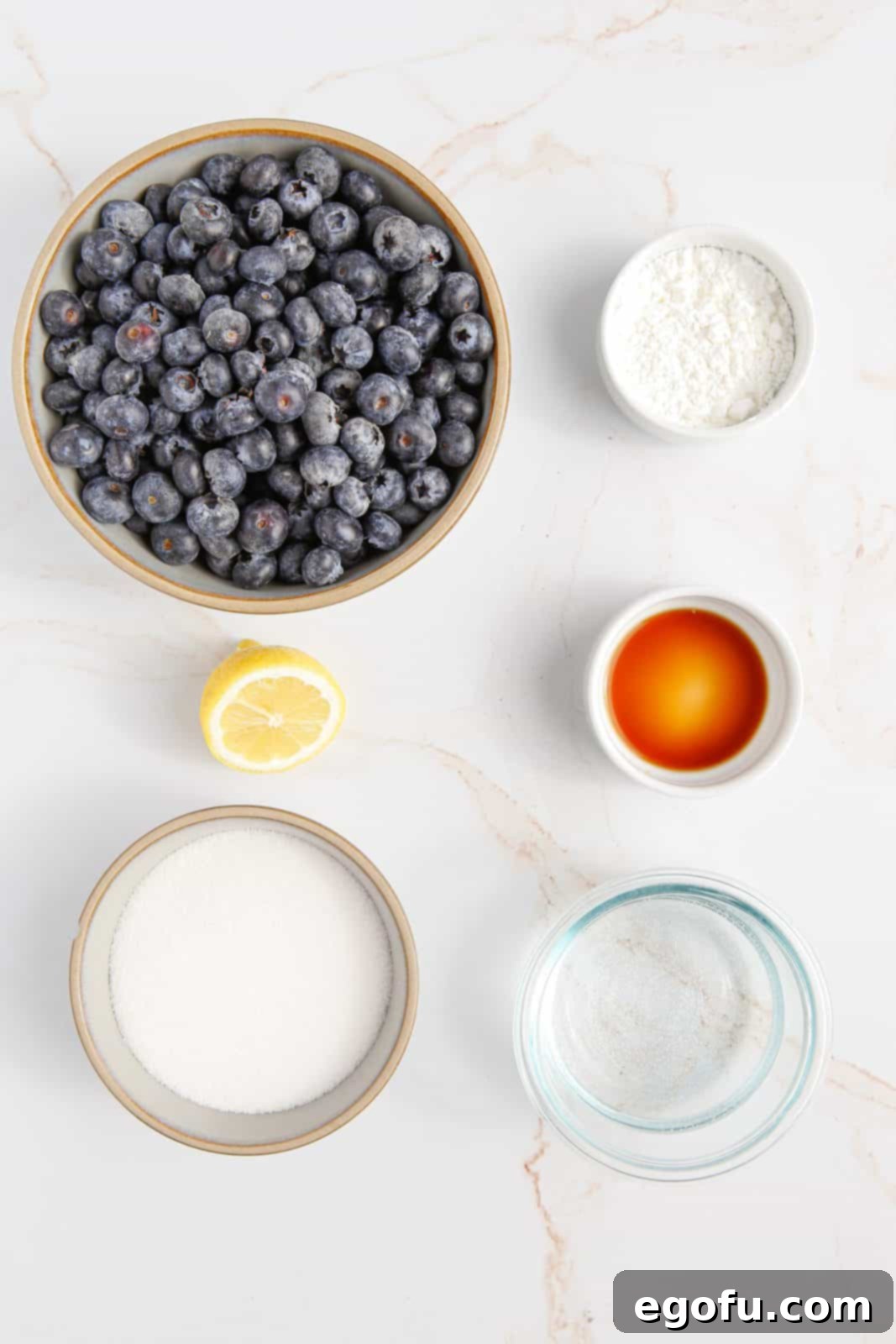 Ingredients needed: granulated sugar, cornstarch, blueberries, water, lemon juice and vanilla extract.