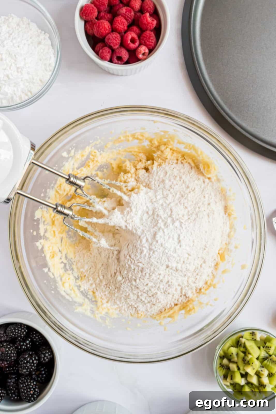 Salt, baking powder, and flour added to bowl after egg and vanilla.