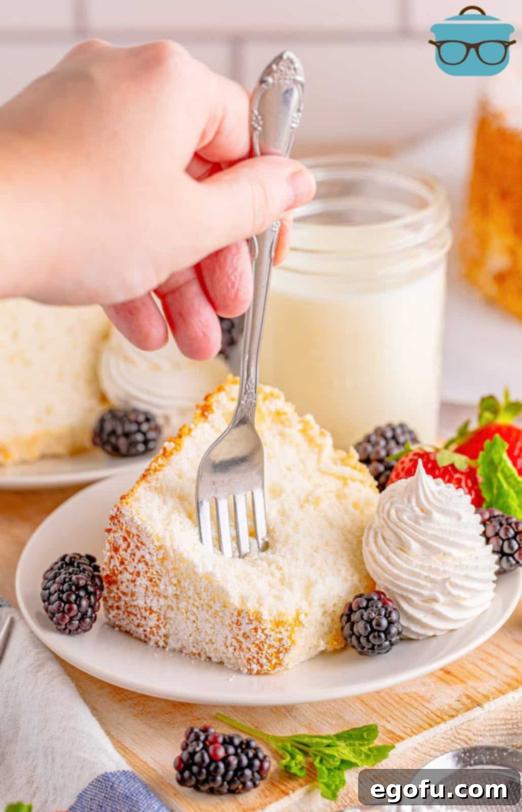 A beautifully baked Homemade Angel Food Cake, golden brown and perfectly risen.