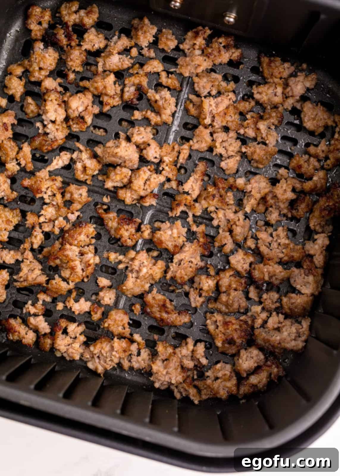 Finished sausage in air fryer crumbled.