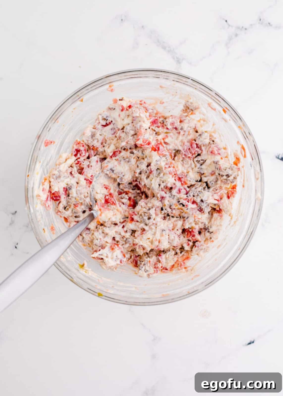 Filling ingredients mixed together in bowl.