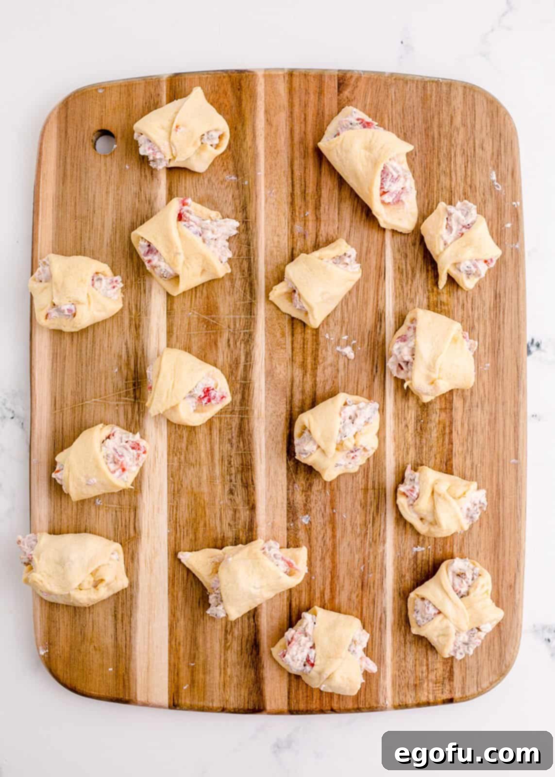 Crescent rolls wrapped around filling.