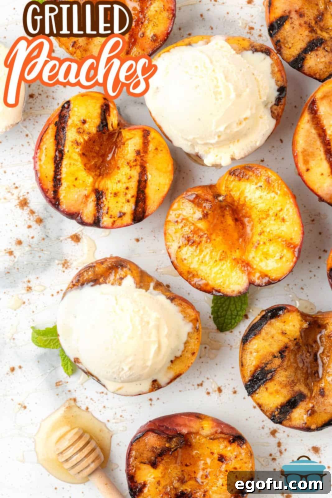 Pinterest image overhead of Grilled Peaches with some with a scoop of ice cream.