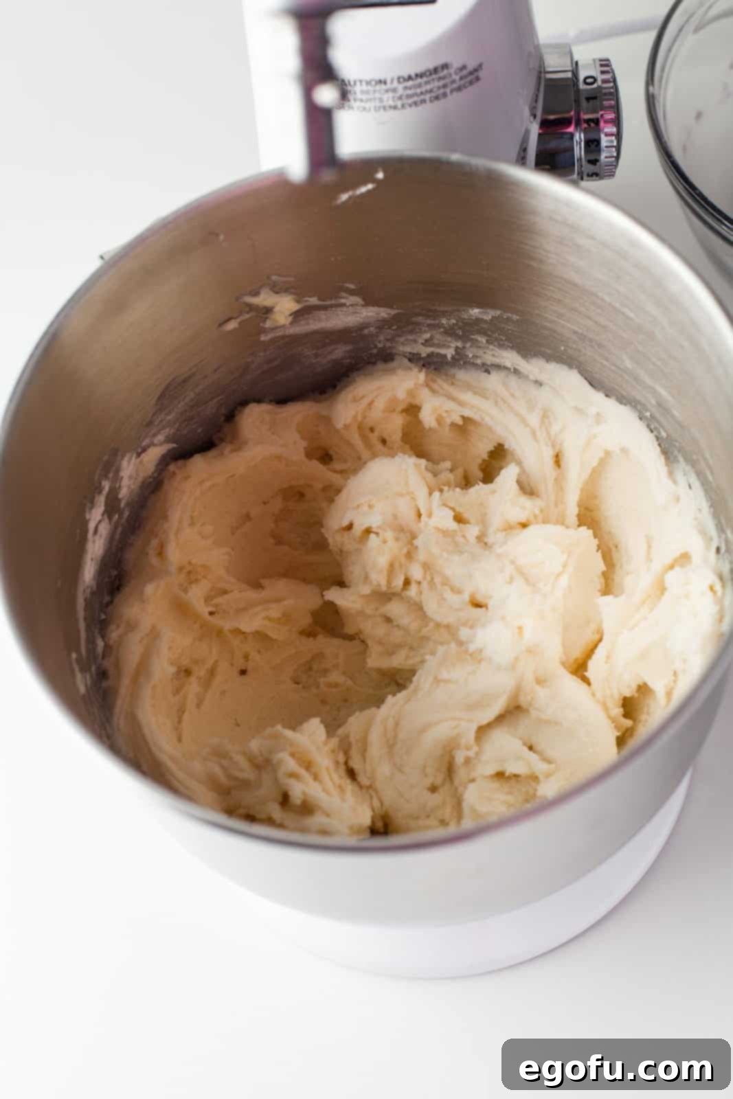 Frosting beaten together in bowl of stand mixer.