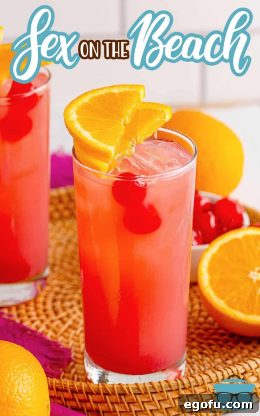 Coastal Affair Concoction 3 Pinterest image of Sex on the Beach on wicker tray with fruit in the background, perfect for sharing.