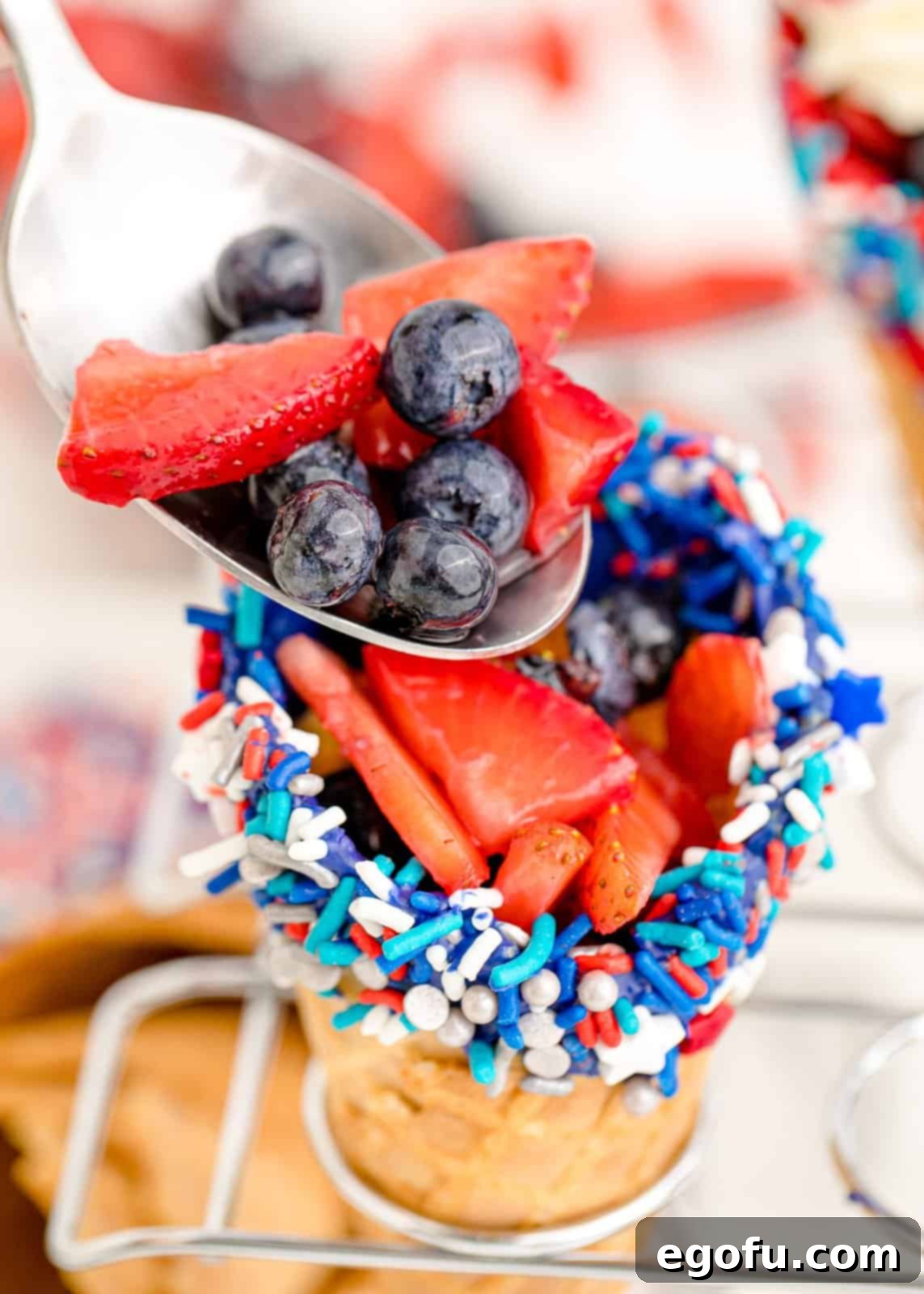 Fruit being added to cones.