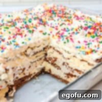 Square image of slices removed from Ice Cream Sandwich Cake in pan.