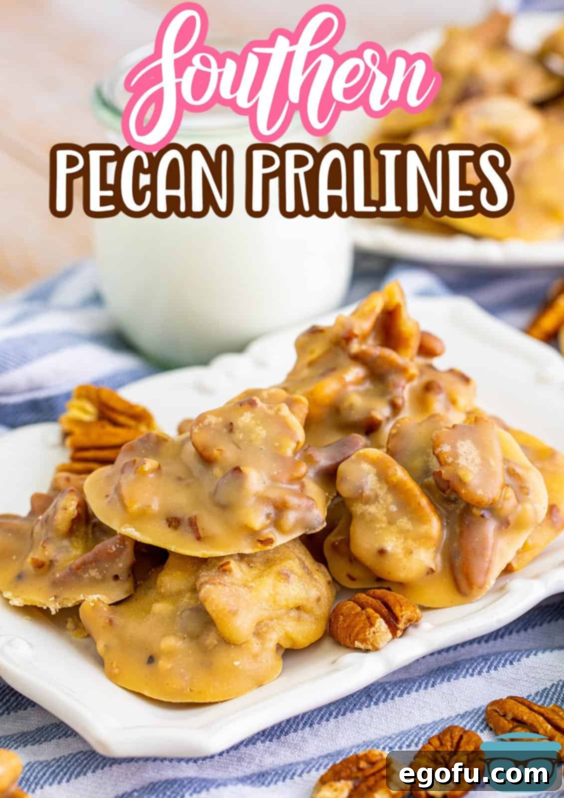 Decadent Southern Pecan Pralines 3 Pinterest image of stacked Southern Pecan Pralines on white platter with pecans as garnish.