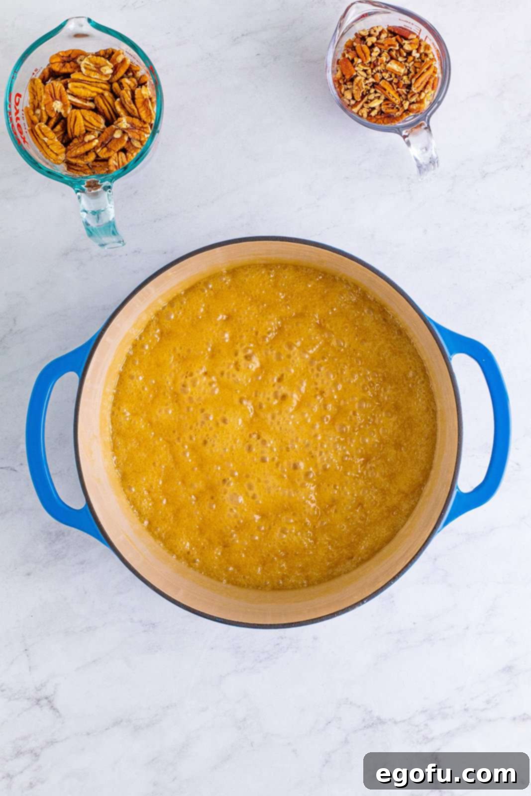 Decadent Southern Pecan Pralines 6 Melted butter sugar mixture in dutch oven.
