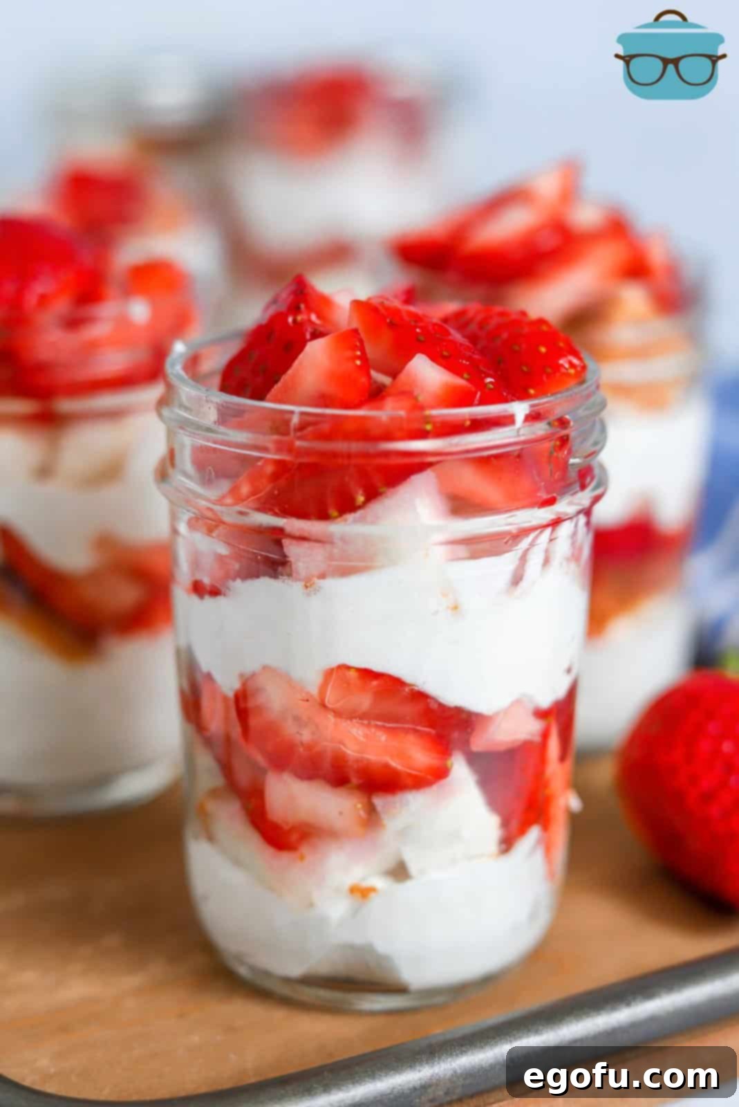 Strawberry Shortcake Jar Delights 2 Strawberry Shortcake in a Jar on wooden platter.