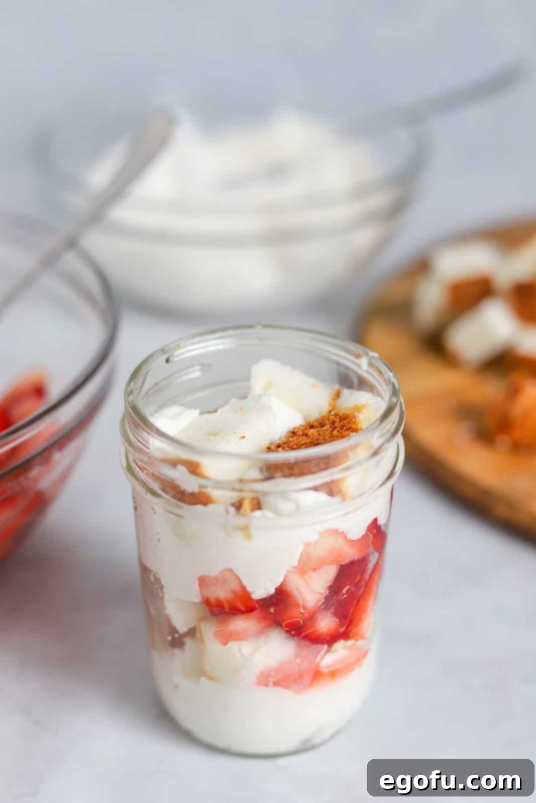 Strawberry Shortcake Jar Delights 12 Cake pieces and whipped cream dded to jar.