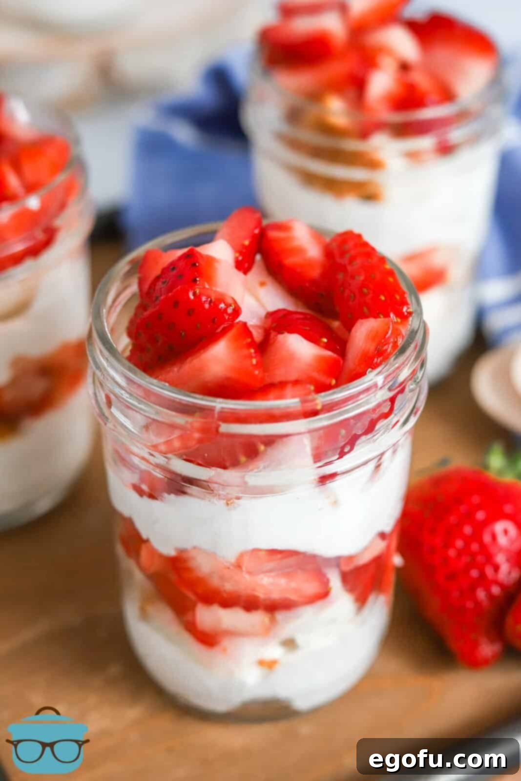 Strawberry Shortcake Jar Delights 13 Overhead of one Strawberry Shortcake in a Jar showing strawberry topping.