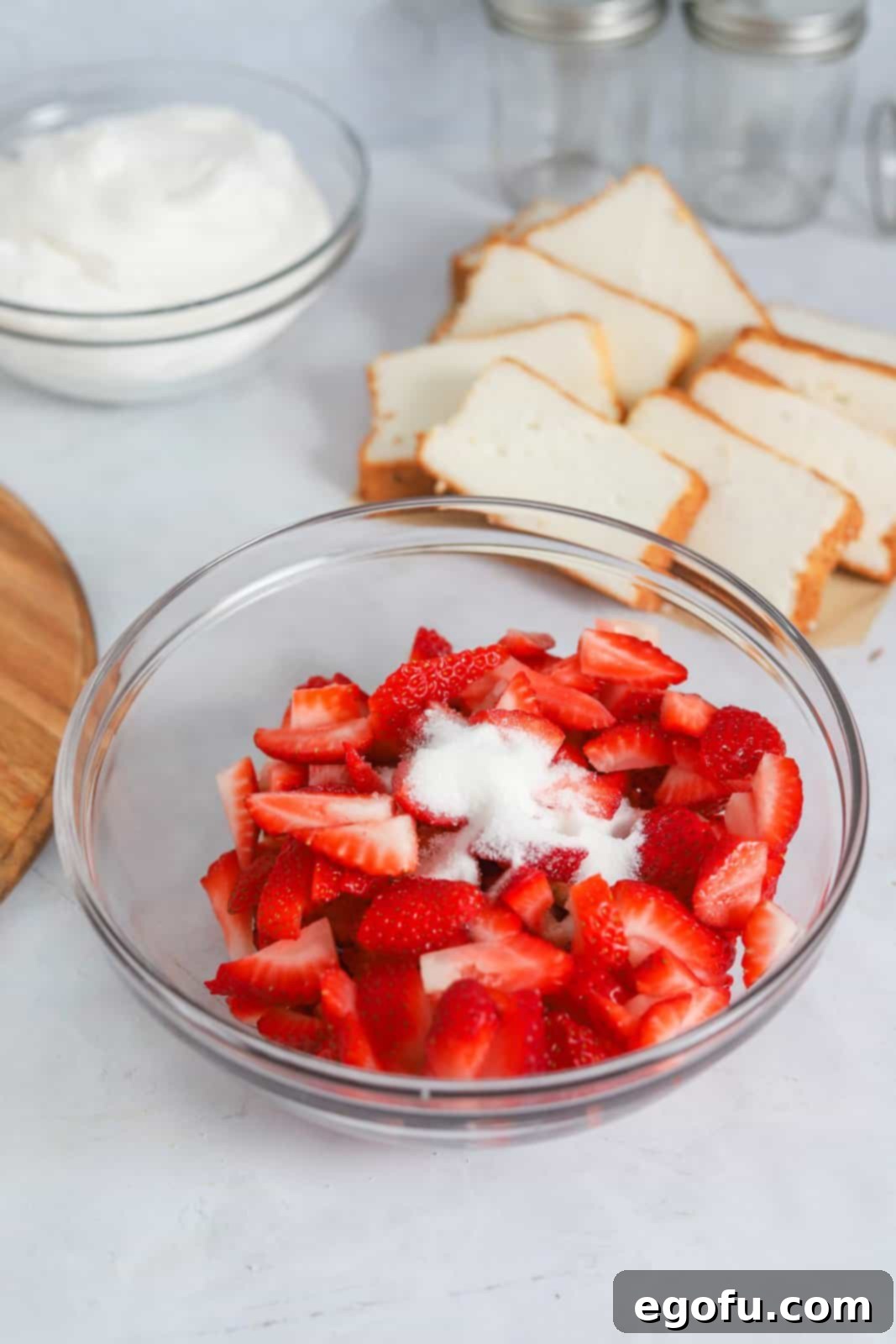 Strawberry Shortcake Jar Delights 6 Strawberries and sugar added to bowl.