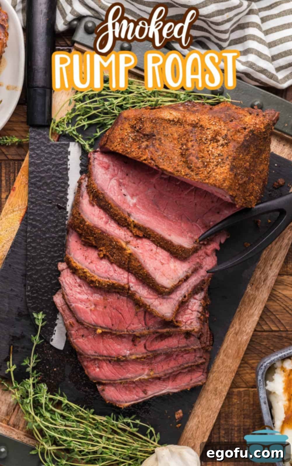 Pitmaster's Smoked Rump 3 An overhead view of a beautifully sliced Smoked Rump Roast laid out on a cutting board, ready to be served.