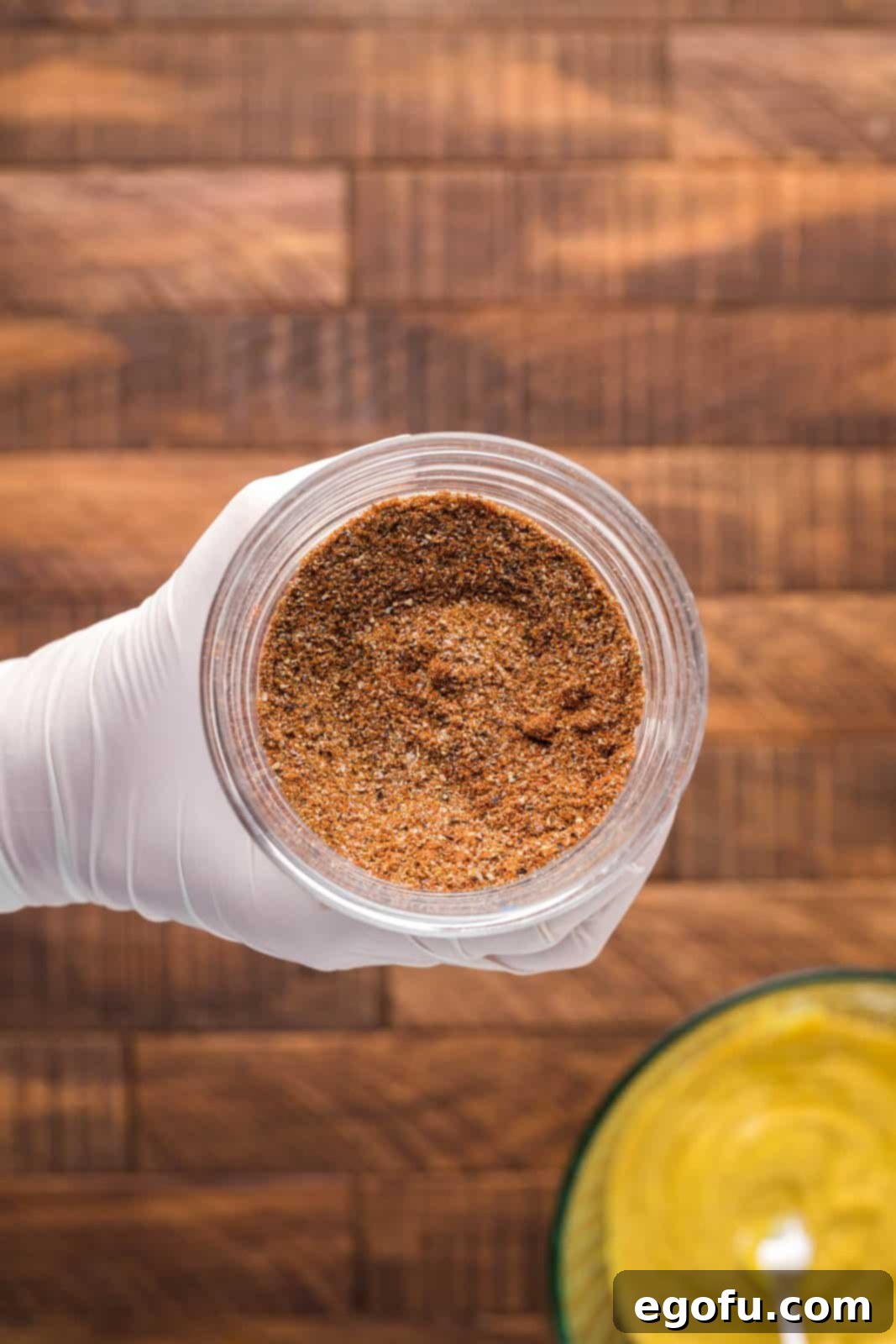 Pitmaster's Smoked Rump 7 A small jar filled with a perfectly blended mixture of salt, pepper, paprika, cumin, chili powder, and onion powder.