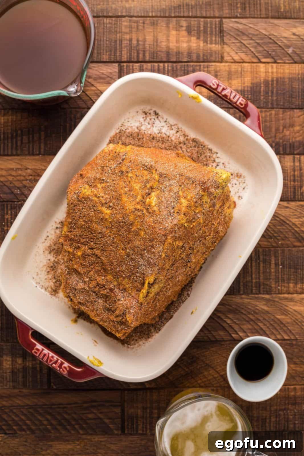 Pitmaster's Smoked Rump 8 The rump roast, now beautifully seasoned with the spice mixture dusted over the mustard paste.