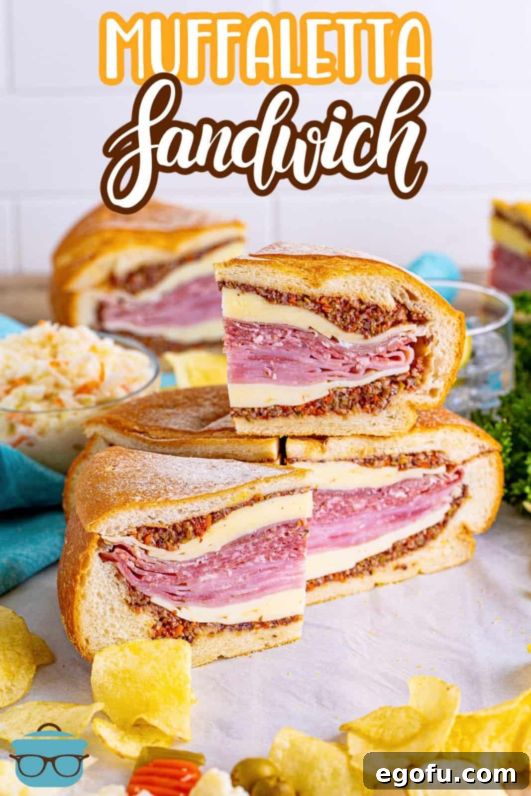 New Orleans' Signature Stack 3 Stacked slices of the Muffaletta Sandwich on board, Pinterest image.