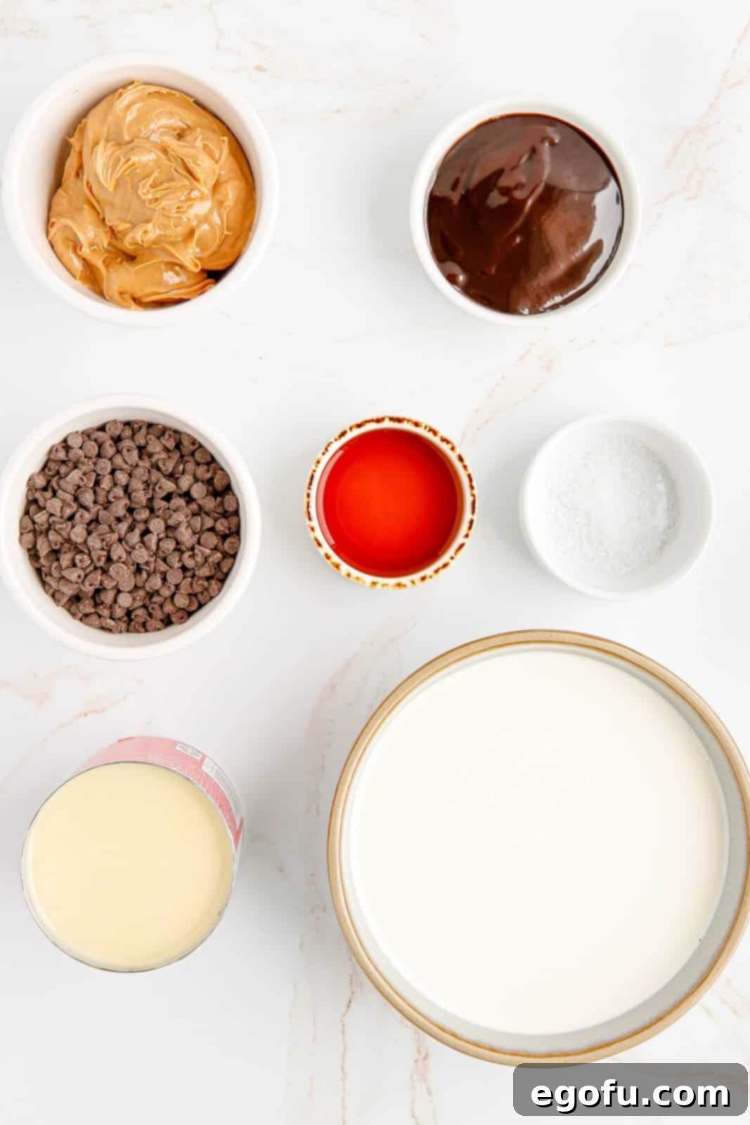 Ingredients needed: heavy whipping cream, sweetened condensed milk, peanut butter, chocolate sauce, mini chocolate chips, vanilla extract, sea salt and ice cream cones.