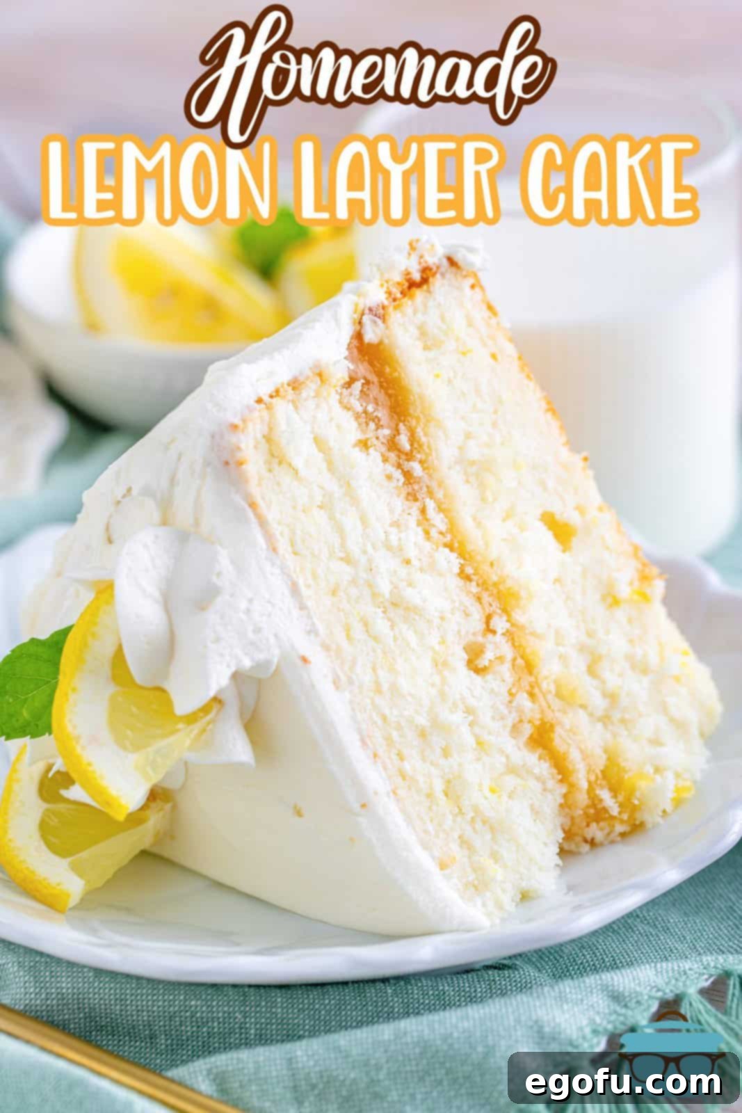 Zesty Lemon Dream Cake 3 Close up of slice of Lemon Layer Cake on white plate Pinterest image.