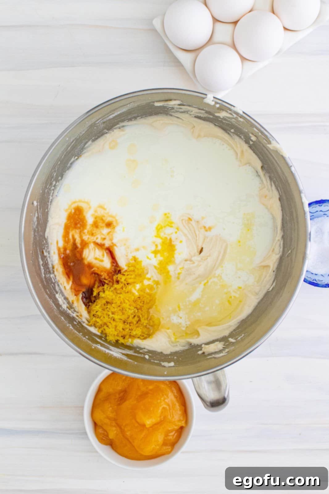 Zesty Lemon Dream Cake 9 Buttermilk, lemon juice, vanilla extract, and lemon zest added to the bowl of stand mixer.