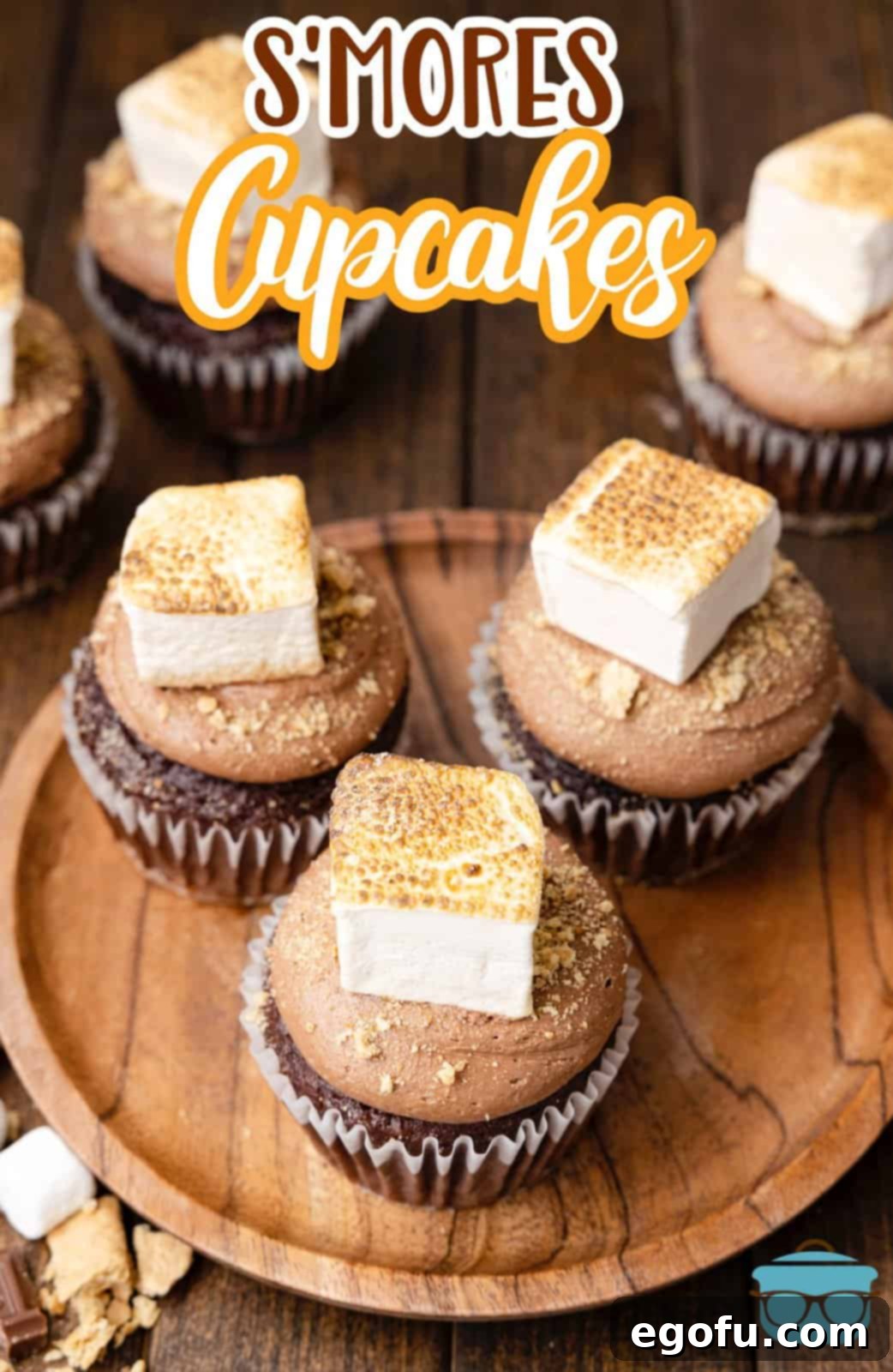 An inviting overhead view of S'mores Cupcakes arranged on a wooden board, ready for sharing. Perfect for Pinterest!