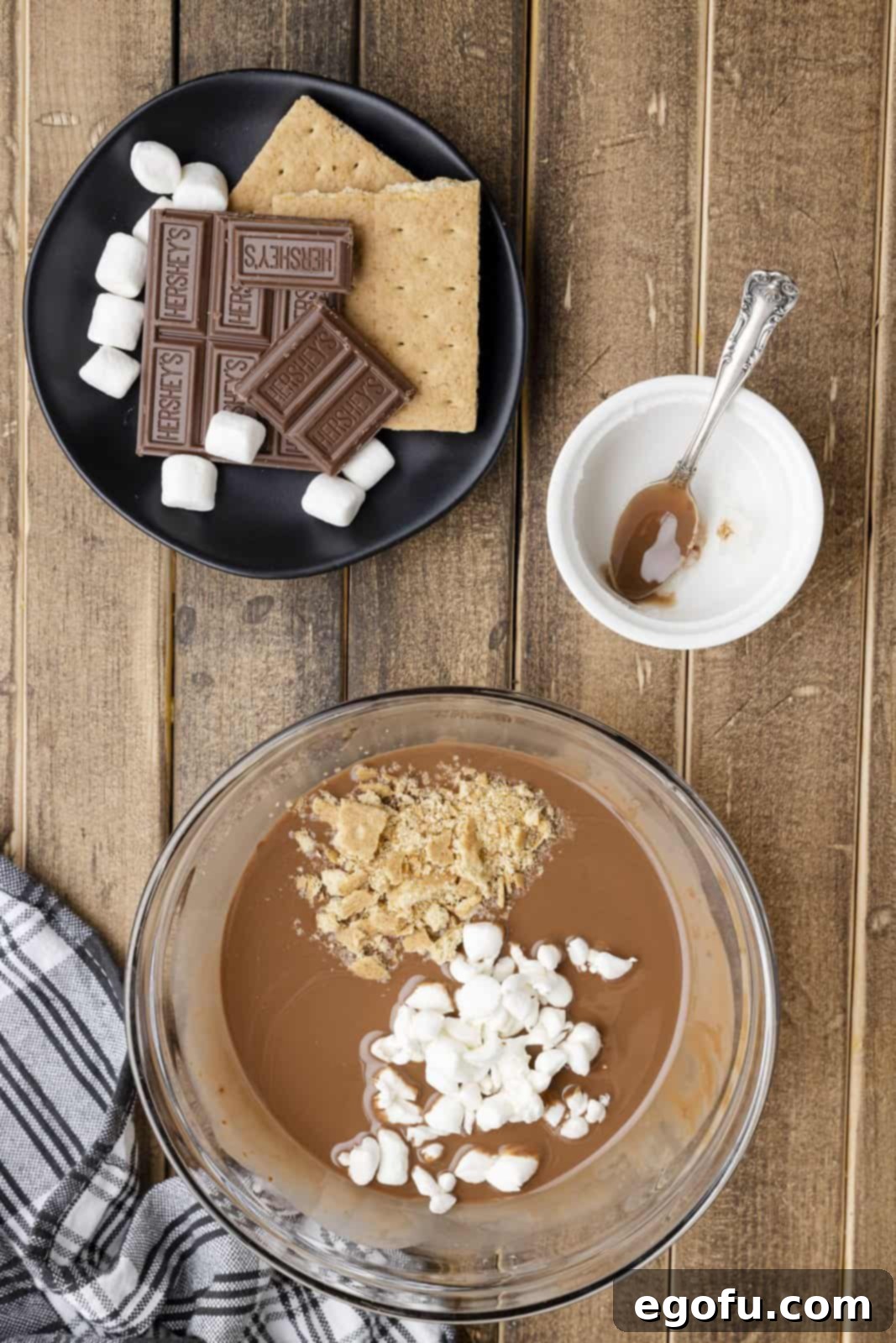 Smores Snap Shell 7 Graham cracker pieces and marshmallows added to bowl of chocolate.