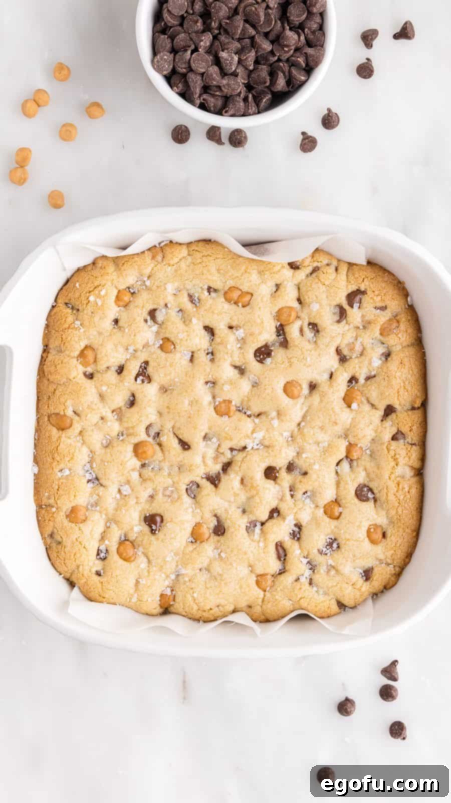 Sweet and Salty Caramel Chocolate Chip Bars 12 Finished bars in baking pan cooling.