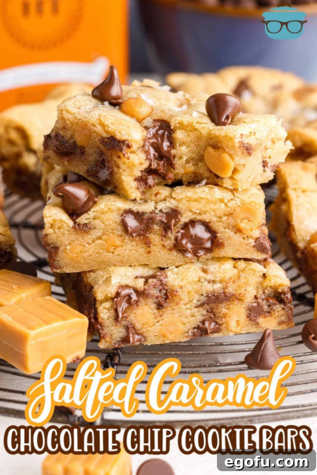 Sweet and Salty Caramel Chocolate Chip Bars 3 Pinterest image of three stacked Salted Caramel Chocolate Chip Cookie Bars with bite taken out of top one.