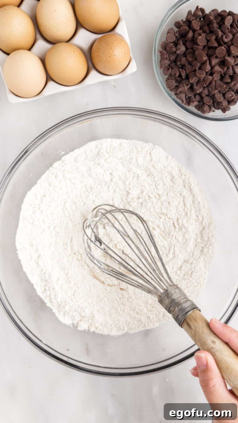 Sweet and Salty Caramel Chocolate Chip Bars 5 Dry ingredients whisked together in bowl.