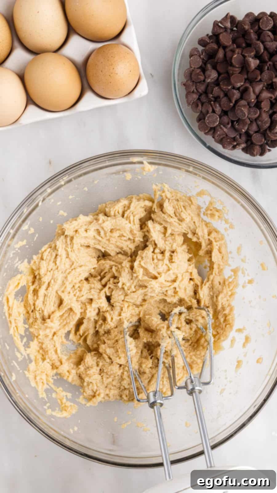 Sweet and Salty Caramel Chocolate Chip Bars 7 Egg beaten into butter sugar mixture.