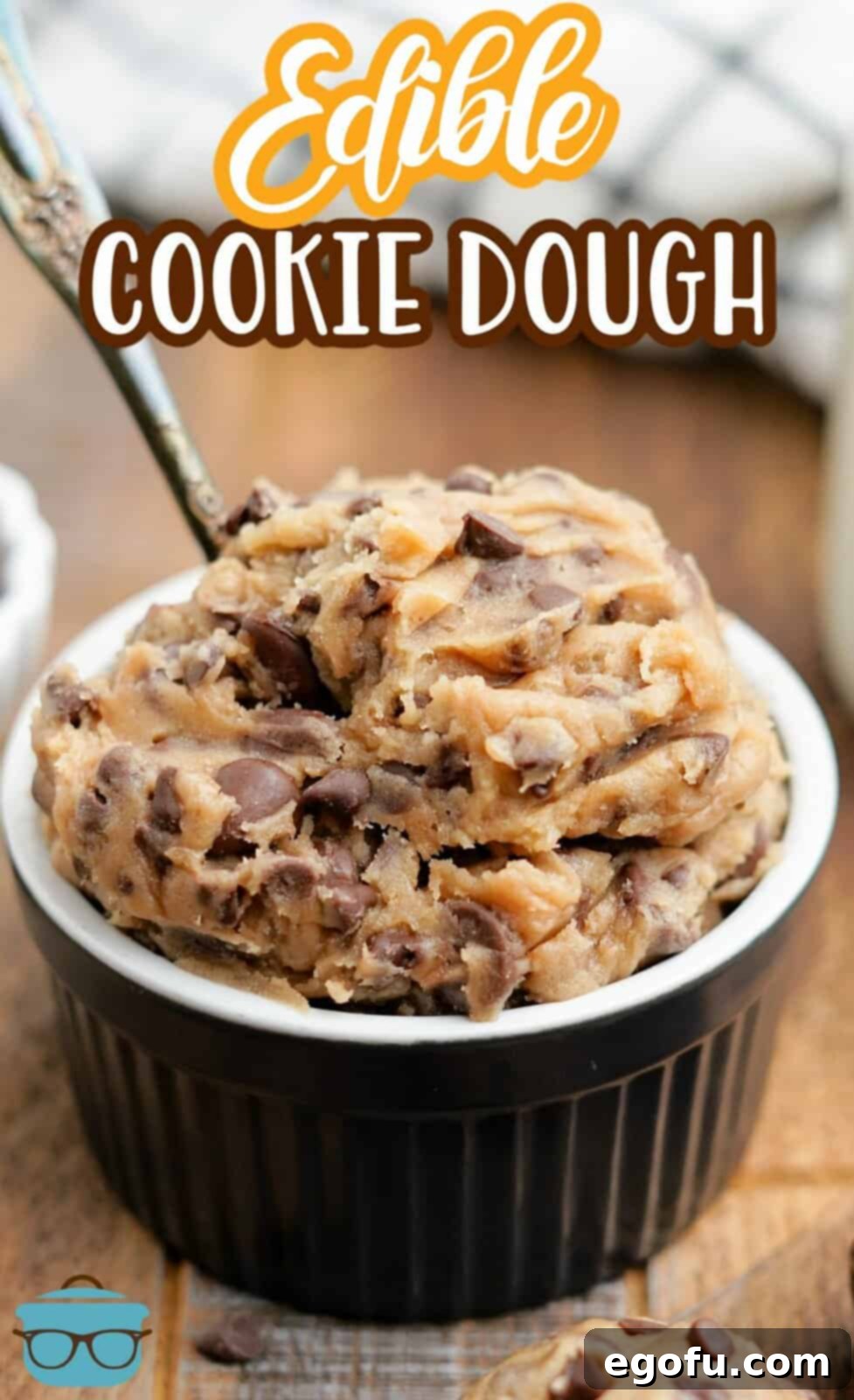 Choc-Chip Dough Delight 3 Close-up of Edible Chocolate Chip Cookie Dough in a ramekin with a spoon, ready for a delicious scoop.