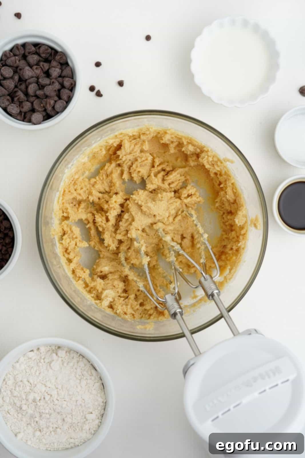 Choc-Chip Dough Delight 5 Softened butter, light brown sugar, and vanilla extract beaten together in a mixing bowl until creamy and fluffy.
